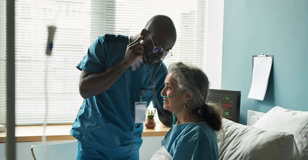 Nurse practitioner evaluating a patient